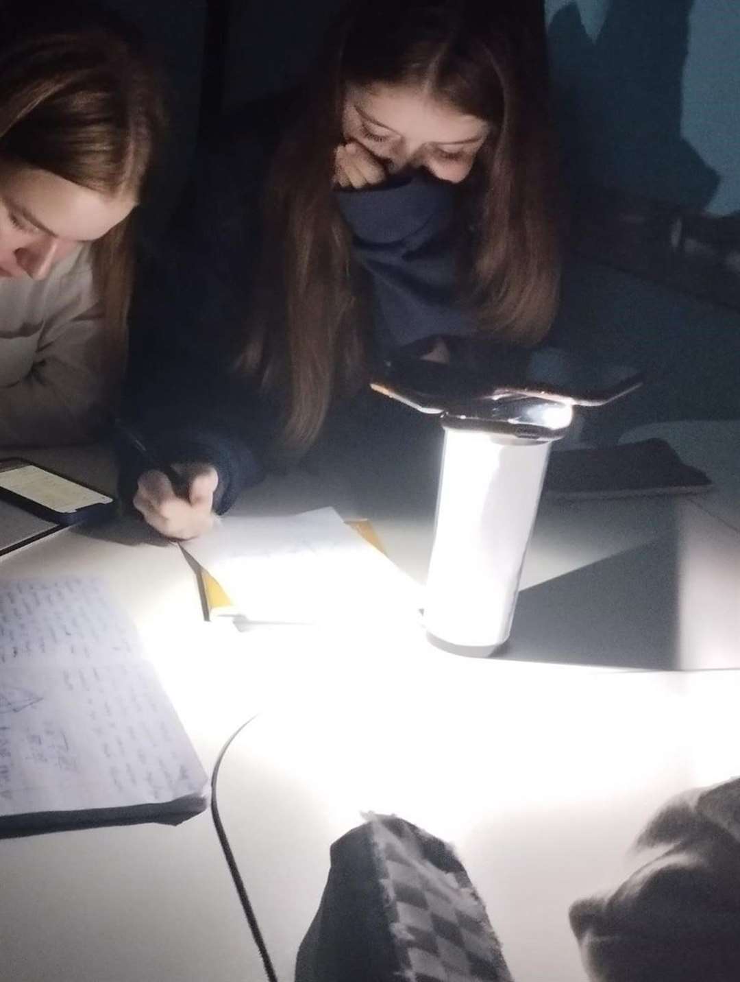 Students working by light. Picture: Dr Euan Bowditch