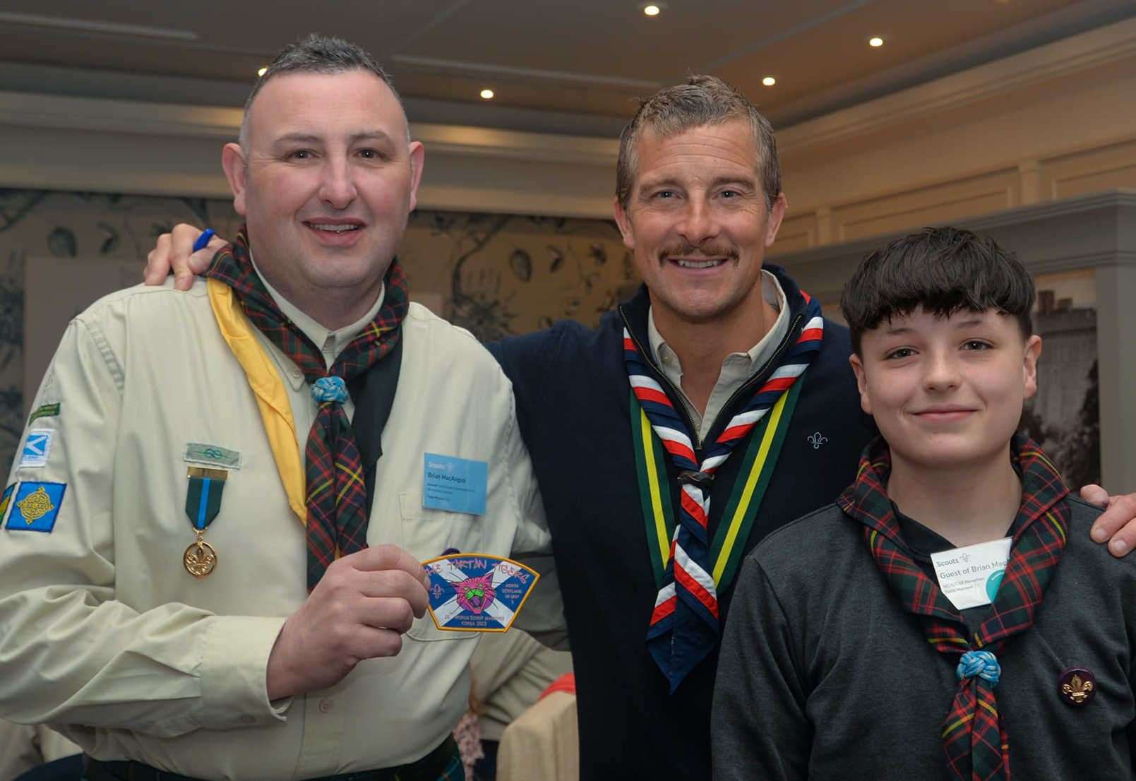 Brian Macangus, pictured with Chief Scout Bear Grylls