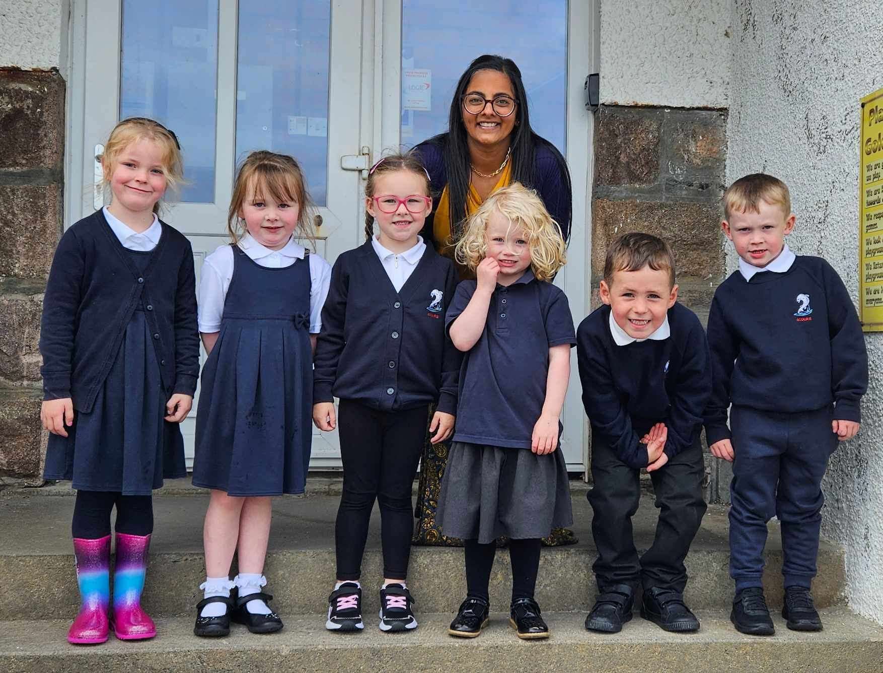The new p1 intake at Scourie Primary School with teacher Krysha Davis. From left Iona Wilson, Chloe Chapman, Ava Macdonald, Eilidh Beveridge, Ally Macleod and Arran Flett.