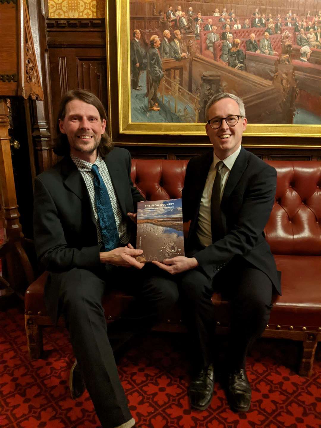 Dr Steven Andrews (left) meeting Lord Parkinson with the dossier.
