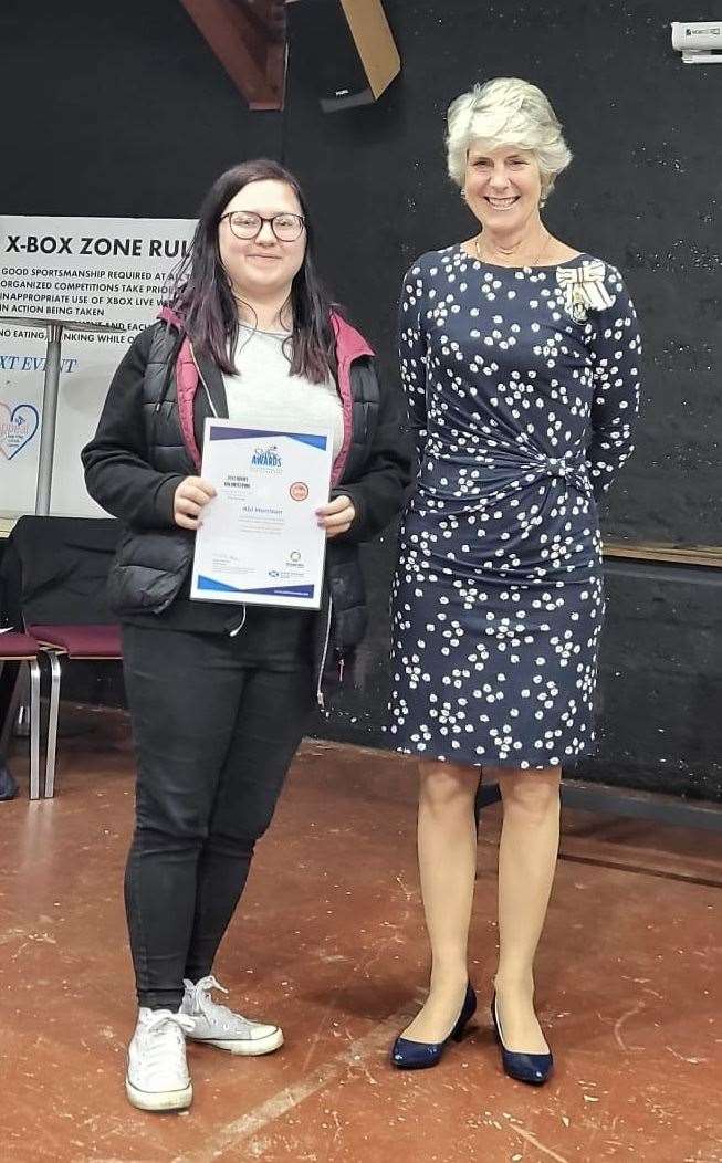 Abi Morrison completed 200 hours of volunteering to receive a 200 hour Saltire award certificate.