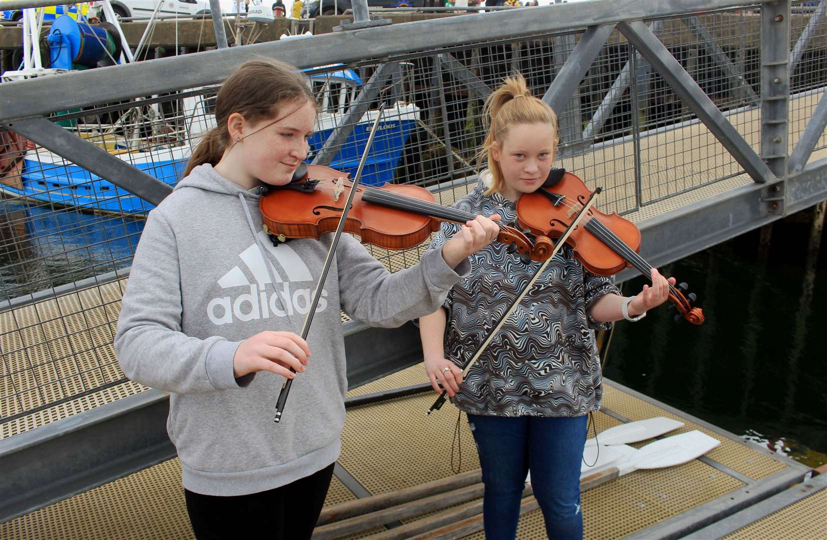 Traditional music on the harbour pontoons. Picture: Alan Hendry