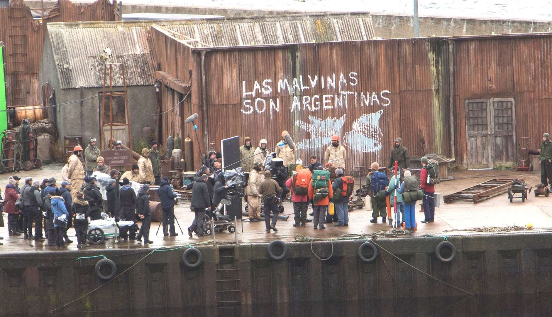 The scene at Lybster Harbour last year as the Netflix drama The Crown was being filmed. Oscar can be seen in the centre of the photograph in a light coloured hat. Photo: Robert MacDonald/Northern Studios