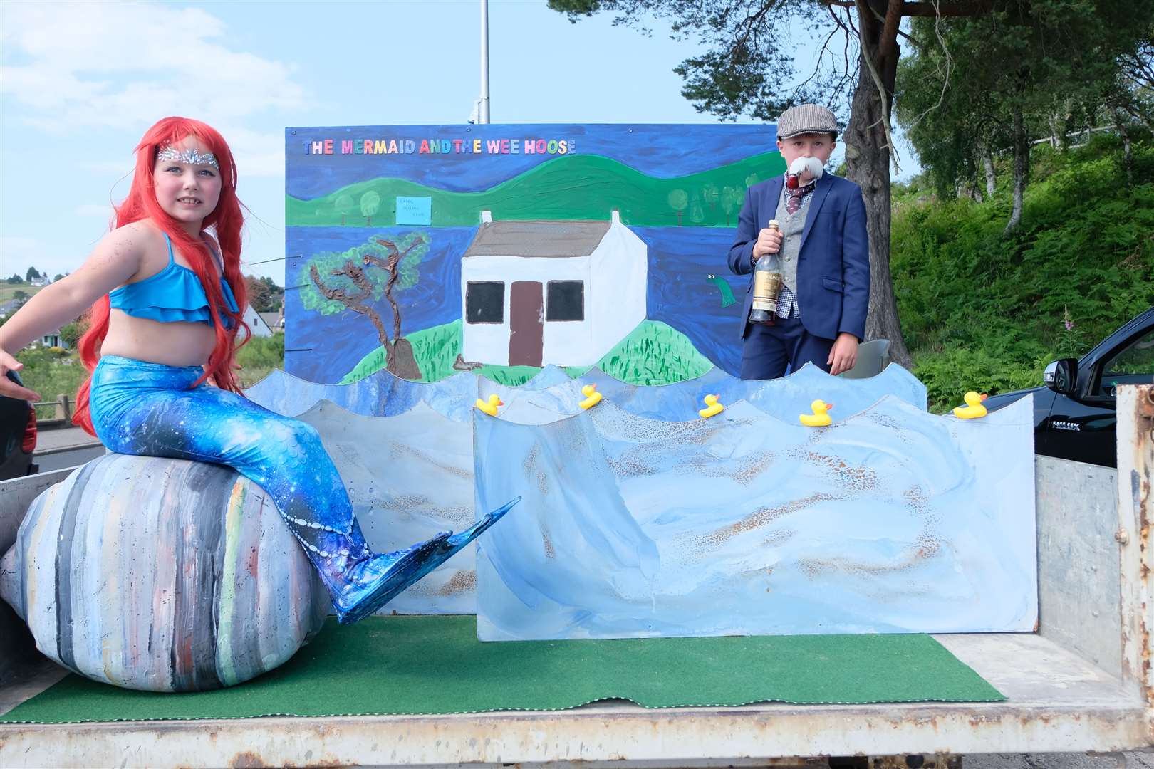 A water themed float called the Mermaid and the Wee Hoose.