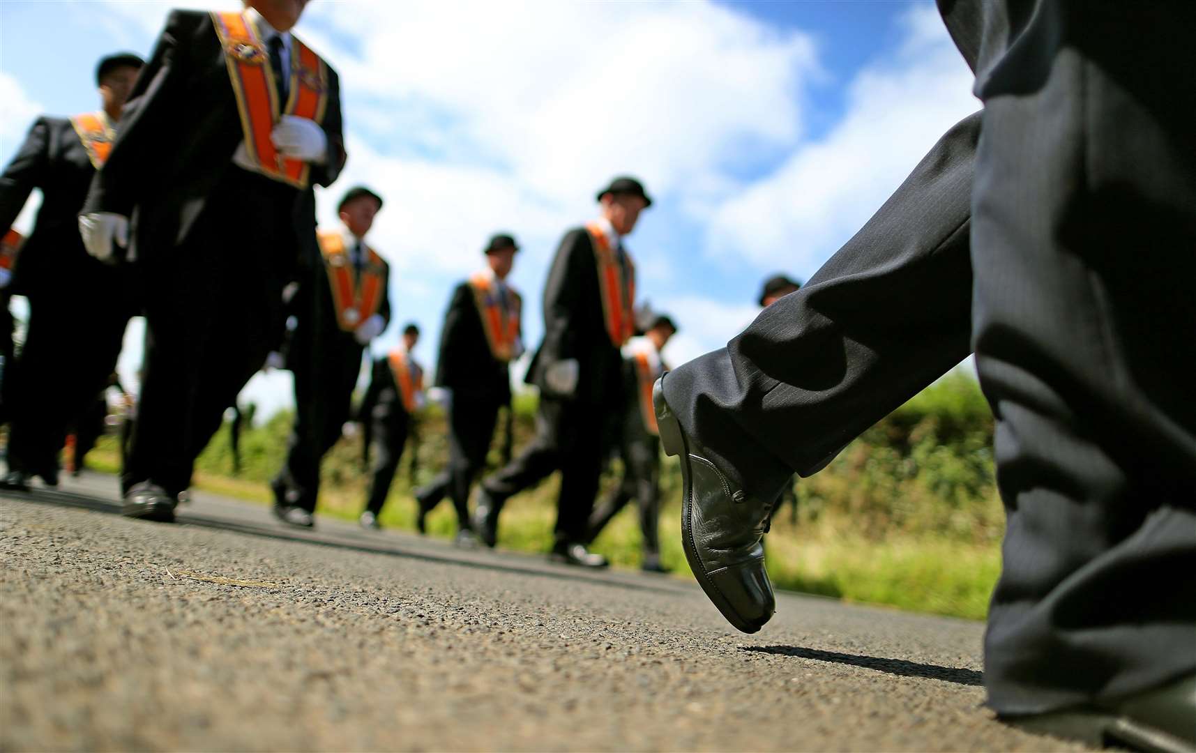 Orange Order members parade along Drumcree Road outside Portadown (PA)