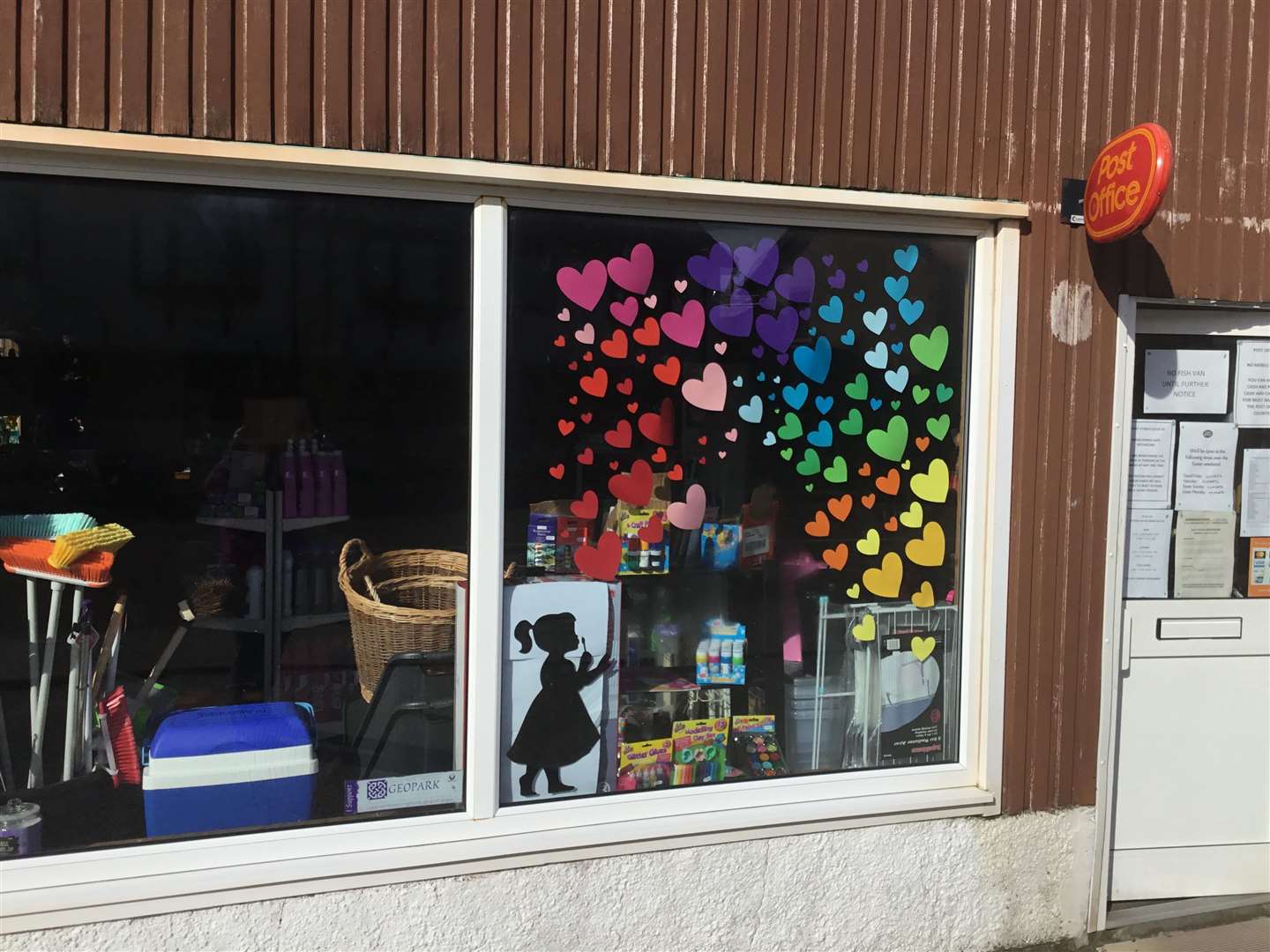 Kinlochbervie residents help create this uplifting display of hearts in the window of their local post office and garage.