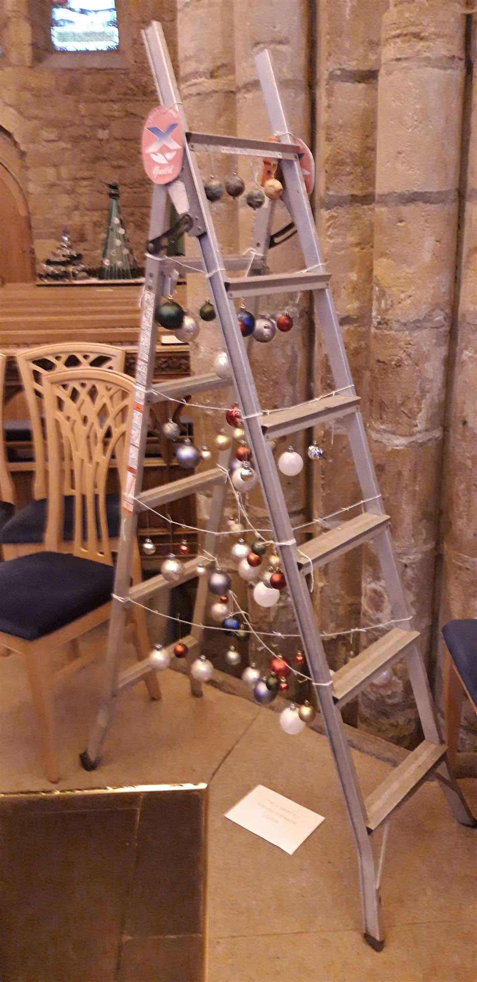 Dornoch Cathedral Guild hit on the idea of using a stepladder to hang festive decorations from.