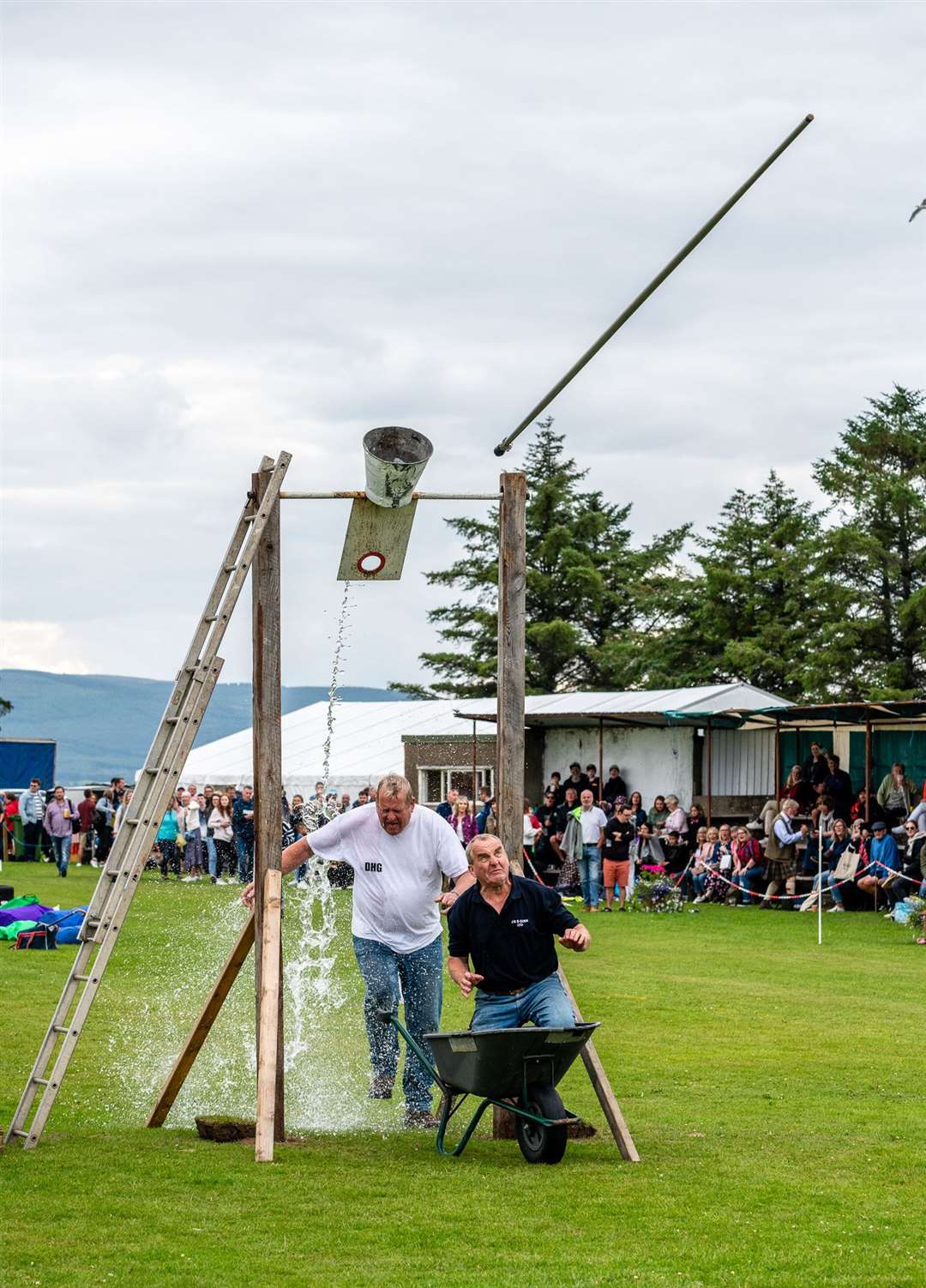 A demonstration of Tilt the Bucket by brothers, Willie and Geordie Gunn. Picture: Andy Kirby