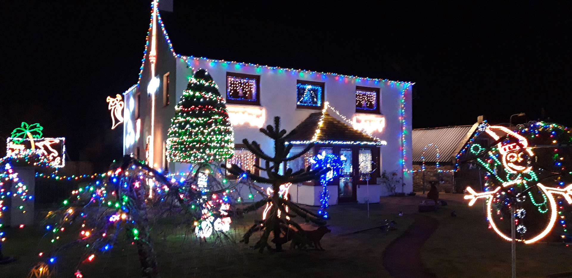 John and Anne Duncan’s Brora home is ablaze with lights during the festive season.