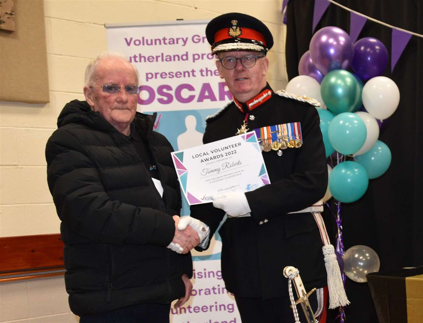 Tommy Roberts receives his certificate at the 2022 Voscars.