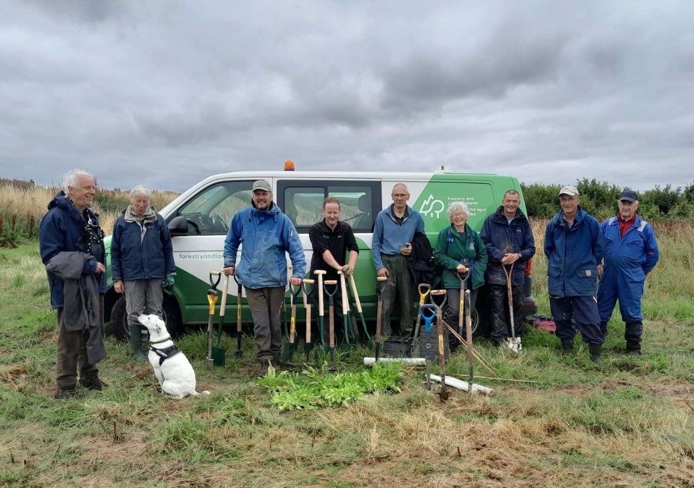 FLS stewardship worksite supervisor Reg Stratton (centre, black T-shirt) with members of the Caithness Environment Volunteer Group. Picture: FLS
