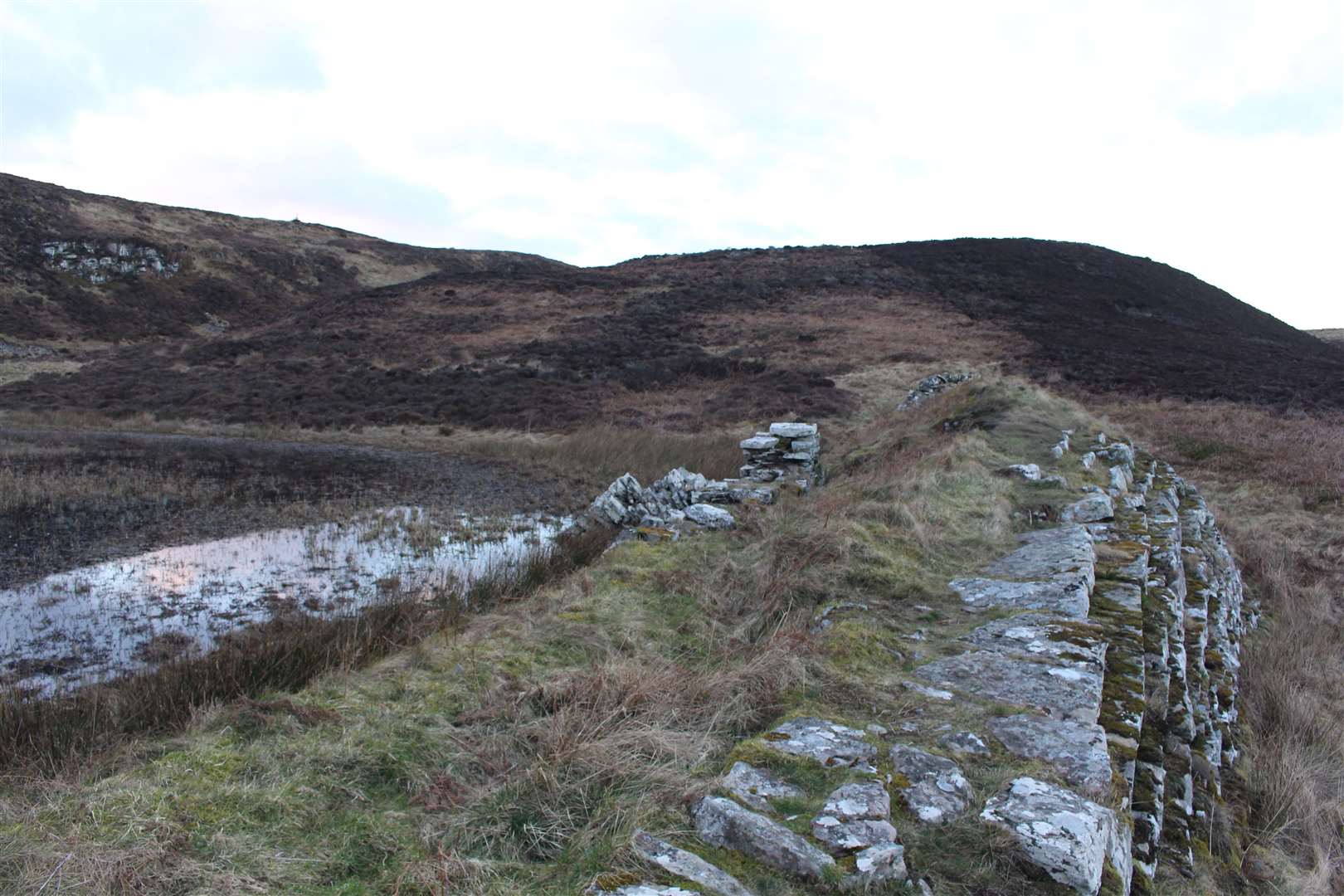 Stone from the chambered cairn was taken in the 1800s to create a nearby dam.
