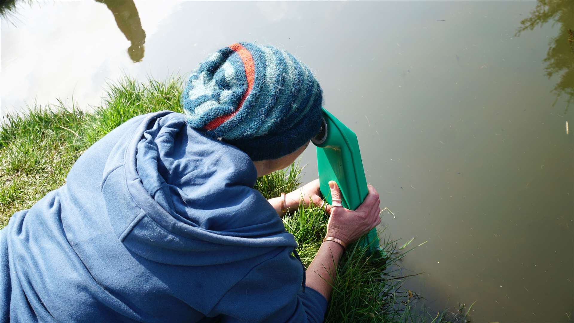 Garance uses a special device to peer into the depths of a pond at the Dunnet event and see what creatures are living there. Picture: DGS