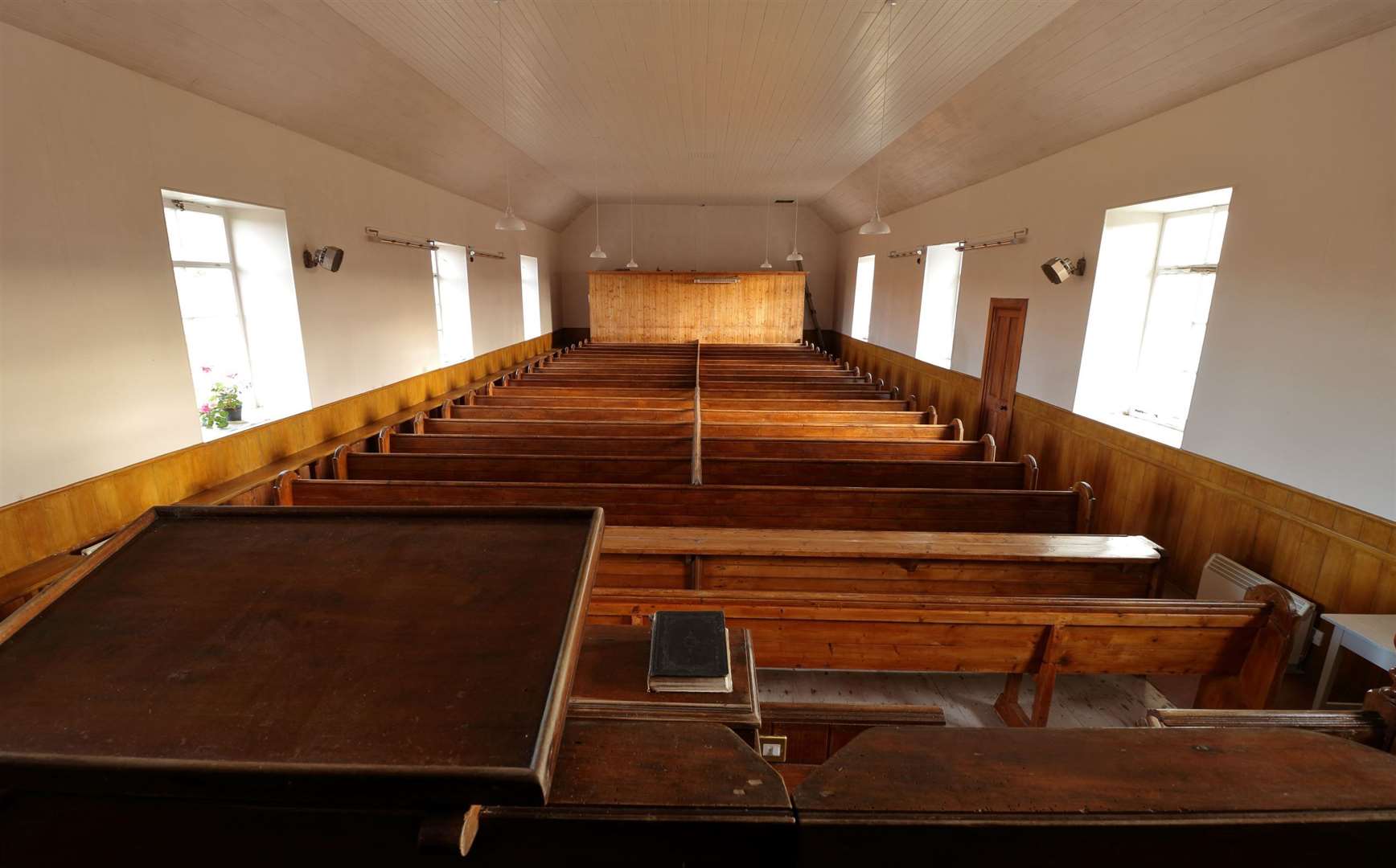 Some of the pews were turned into tables and benches.