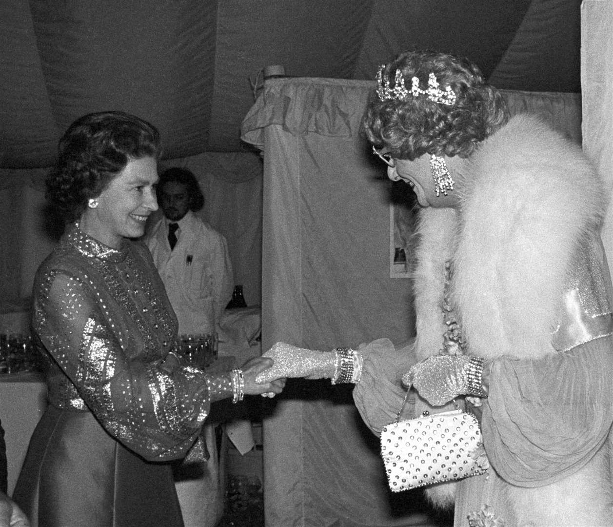 Greeting Queen Elizabeth II in 1977 at Windsor for a gala variety performance in aid of the Queen’s Silver Jubilee Appeal (PA)