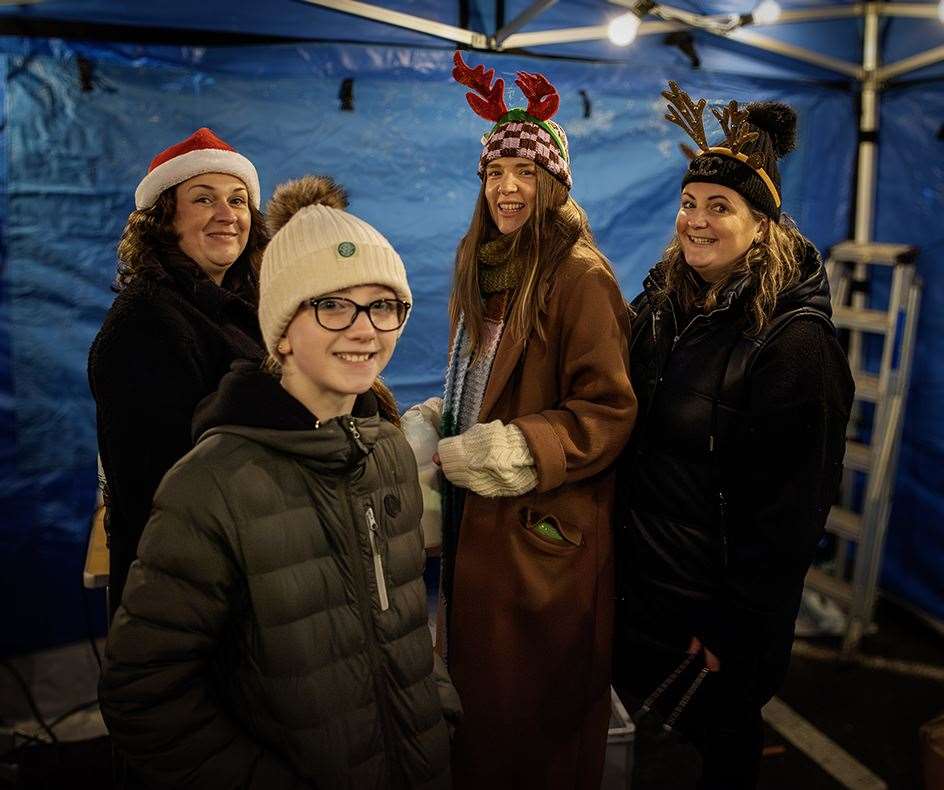 There was a good turnout and the crowd got into the spirit of the occasion, wearing antler headgear and Santa hats. Picture: Martin Ross