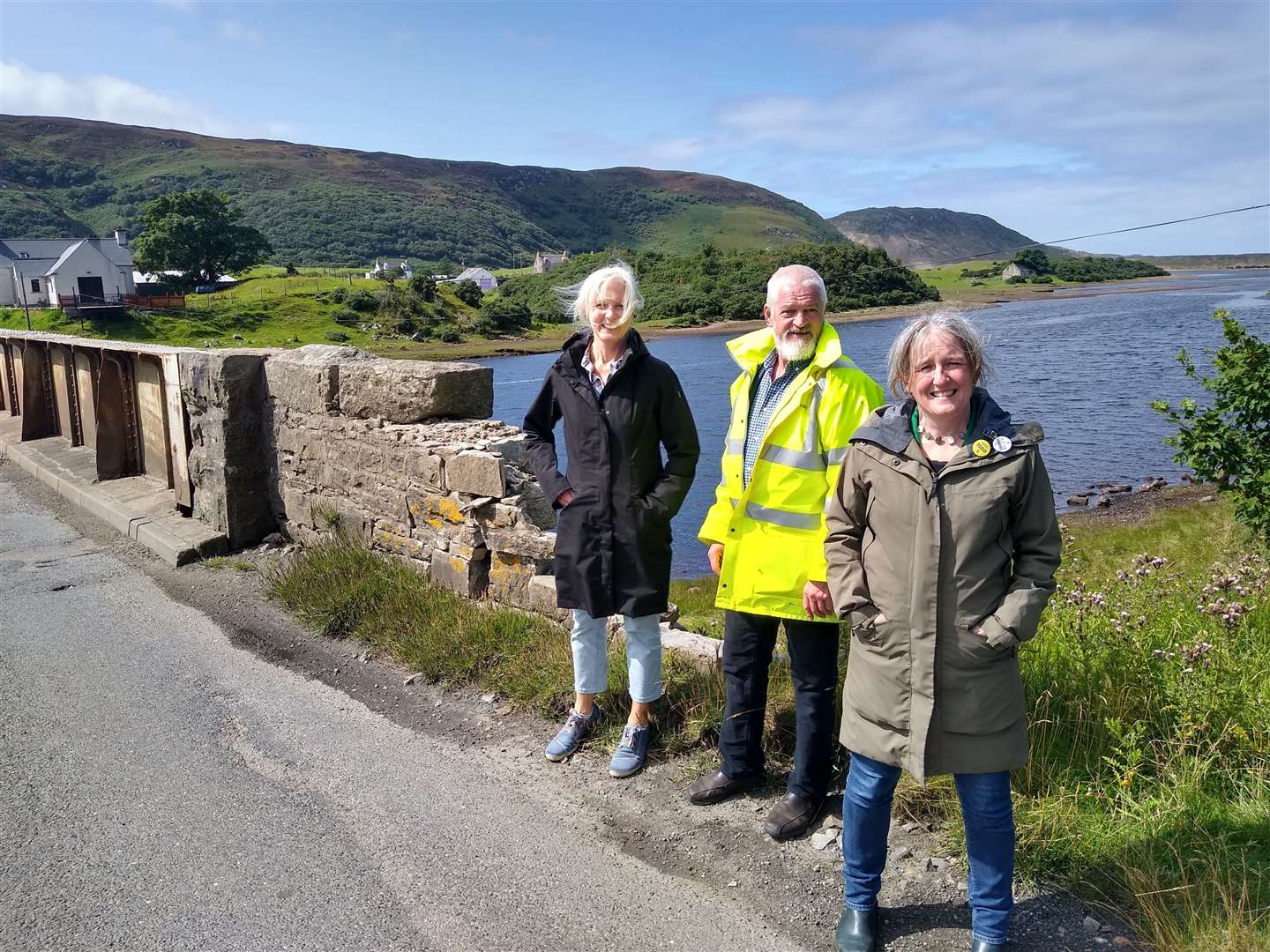 MSP Maree Todd (front) with Jim Mackenzie and Cllr Marianne Hutchison at the Naver bridge.
