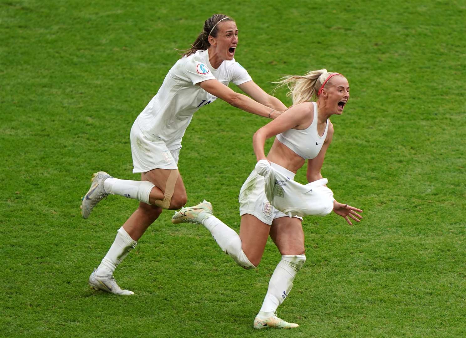 Euro 2022 match-winner Chloe Kelly (right) took her shirt off to celebrate the decisive goal (Joe Giddens/PA)
