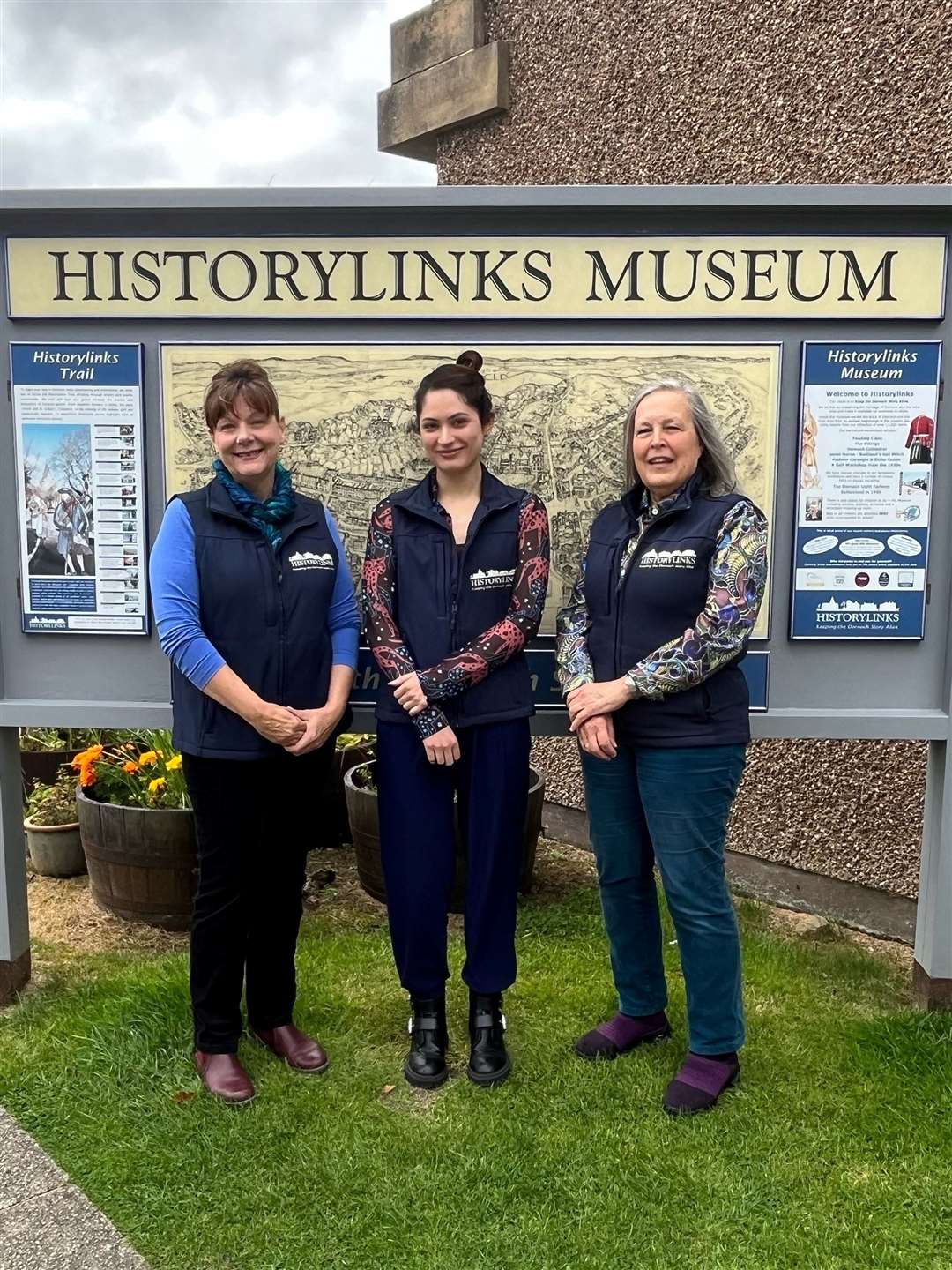 Laura Kasim, centre, with museum curator Lynne Mahoney, left, and museum assistant Caroline Seymour.