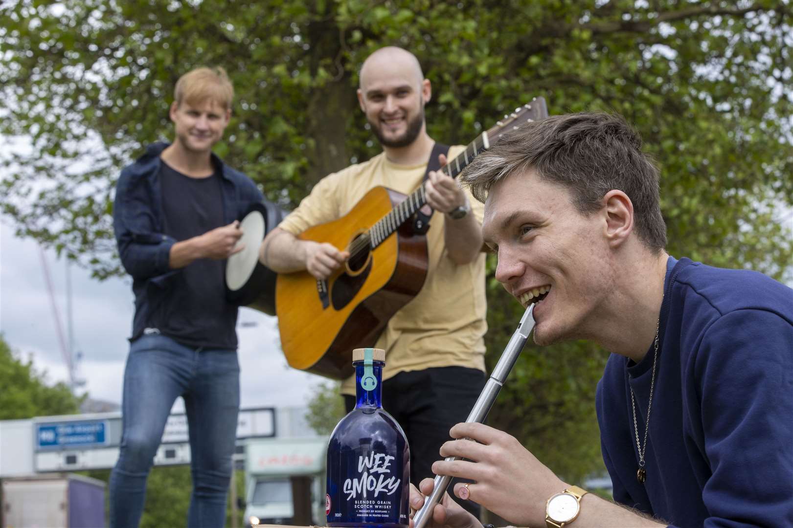 Ali Levack and his band play some tunes to encourage Wee Smoky to improve its flavour.
