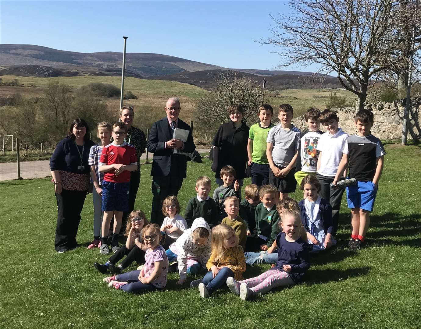 Lord-Lieutenant Patrick Marriott with Rogart Primary School pupils who entered the competition.