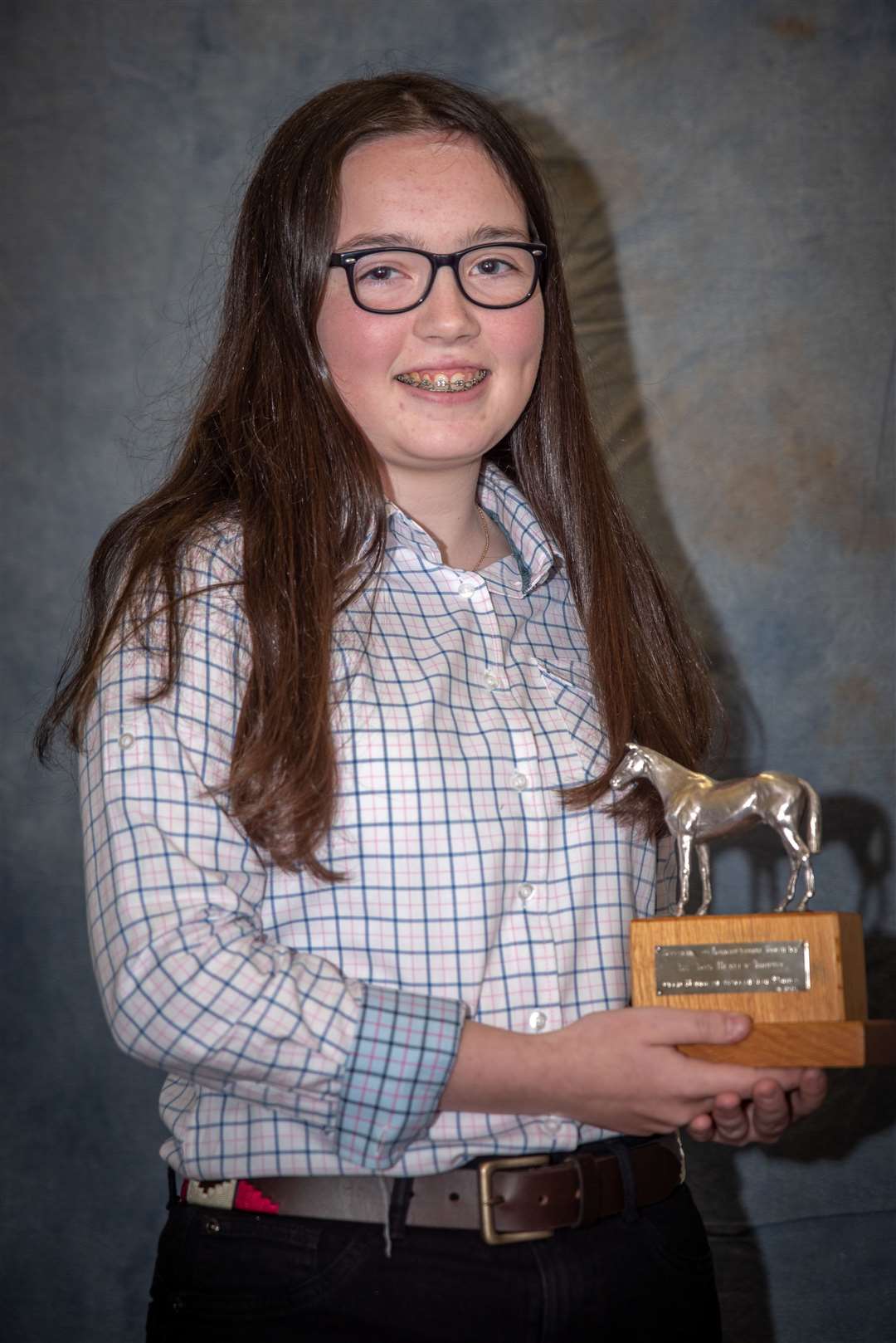 Grace Cockburn with the Tom Hexley Trophy.