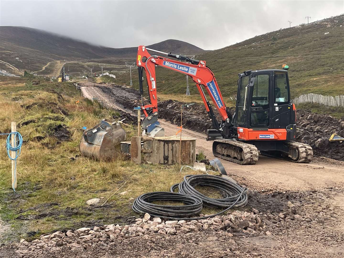 Work is under way to instal two magic carpets at Cairngorm Mountain to serve snowsports and mountain biking.