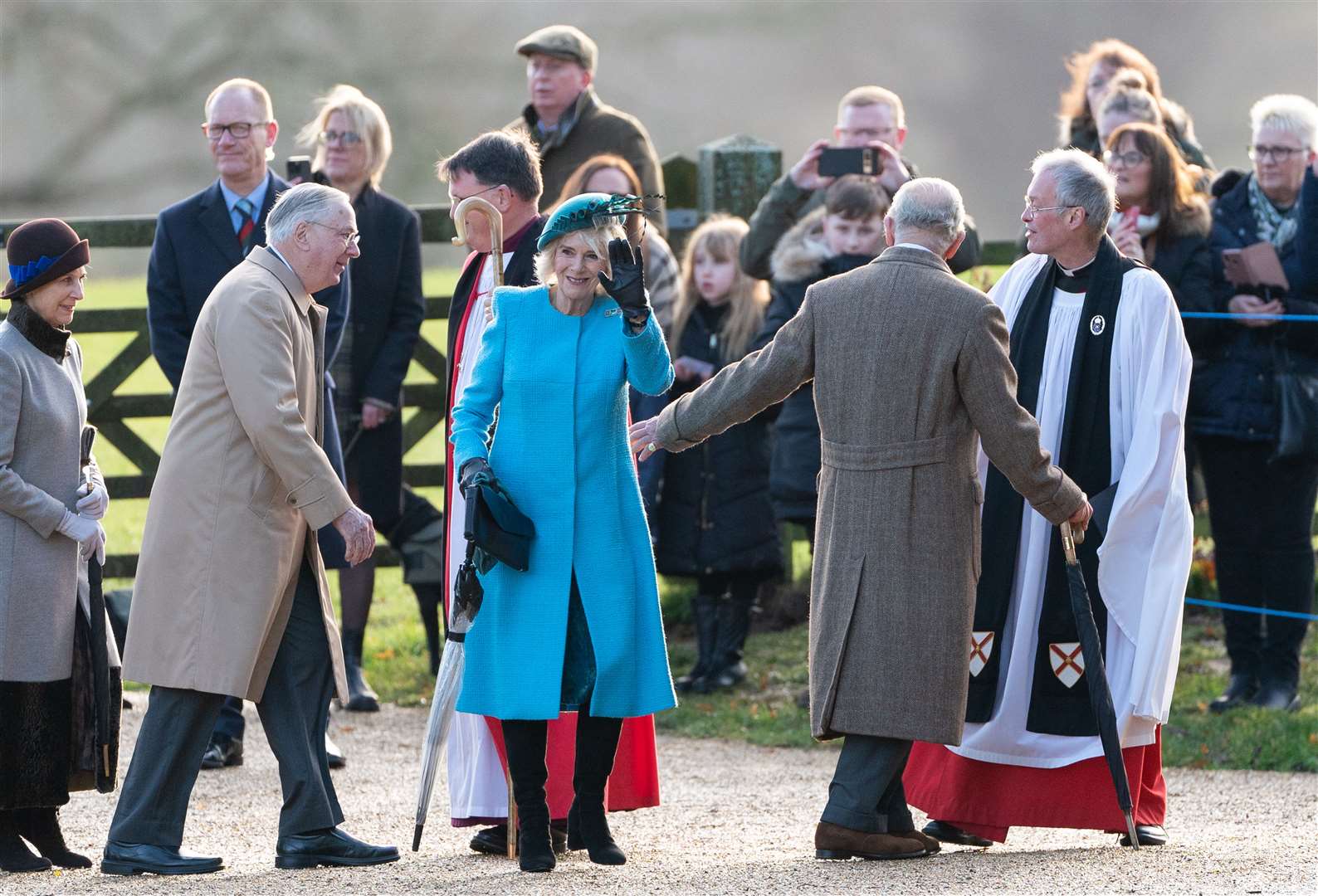 The King and Queen are greeted by the Bishop of Norwich and Reverend Canon Dr Paul Rhys Williams (Joe Giddens/PA)
