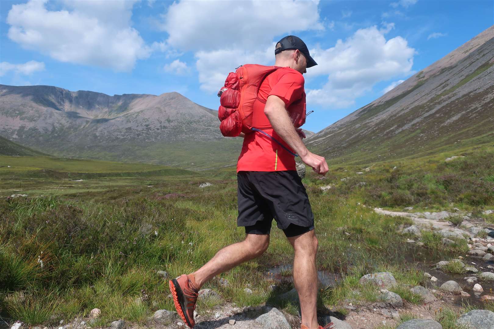 Moving along the Lairig Ghru path with the Cairngorms mountains for company.