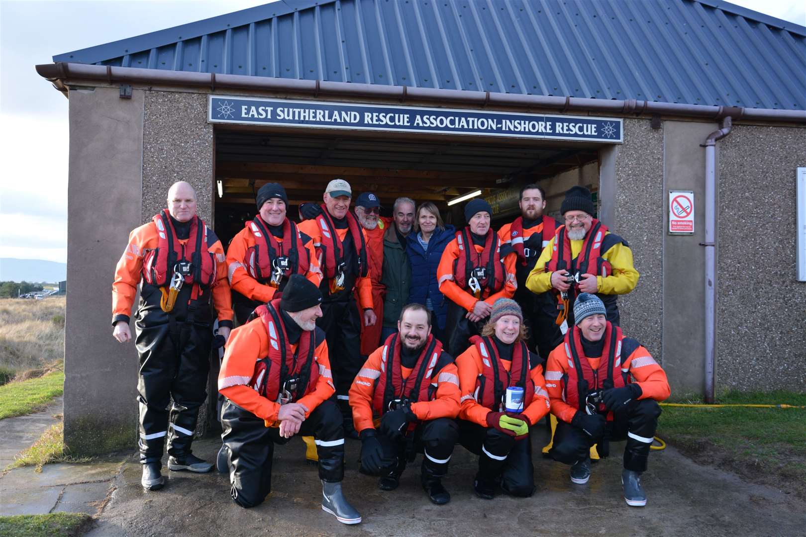 ESRA's volunteer crew outside their current boat shed in Dornoch.
