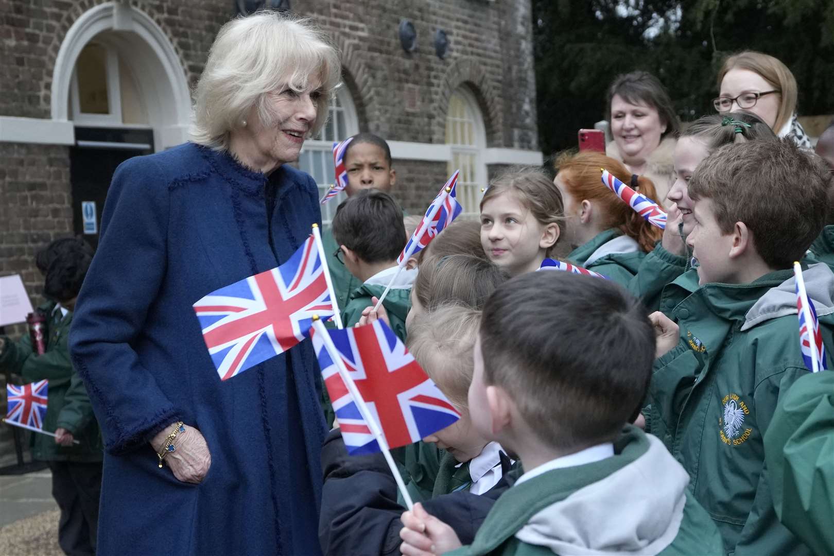 The Queen Consort meets children from Our Lady and St John’s Primary school (Kirsty Wigglesworth/pa)