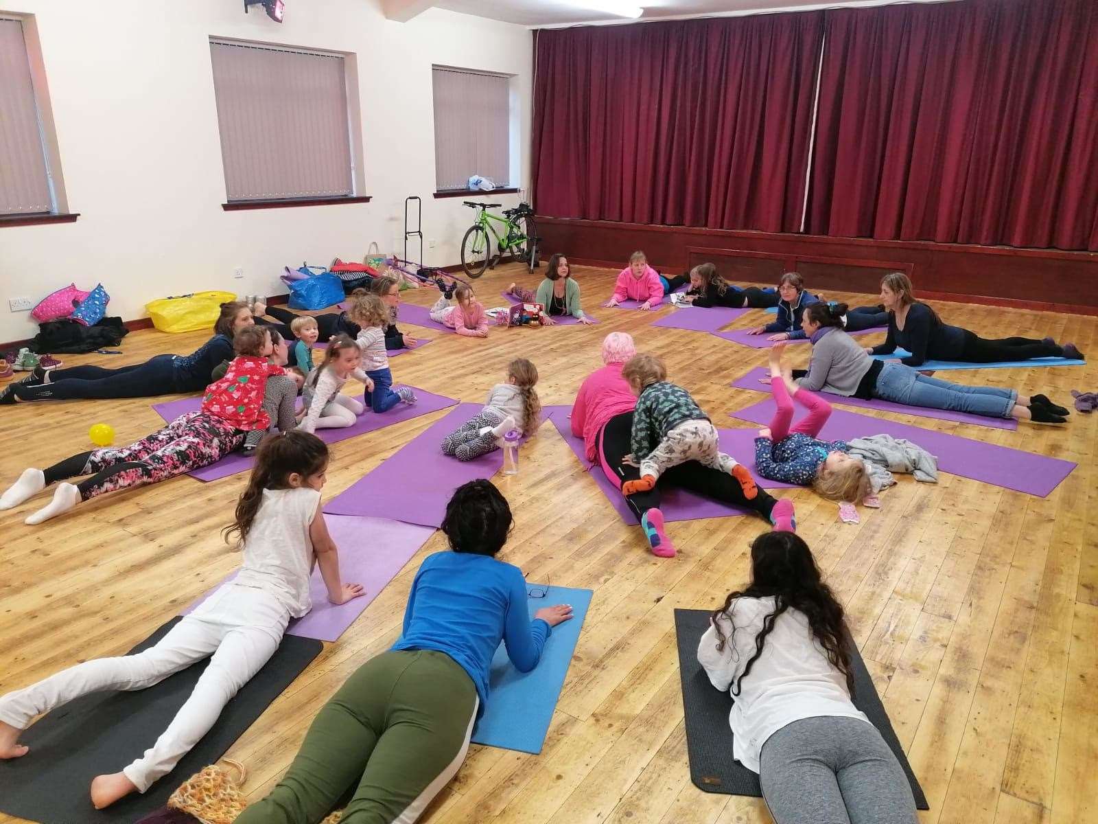 All ages attended the family yoga session led by Lana Frost.