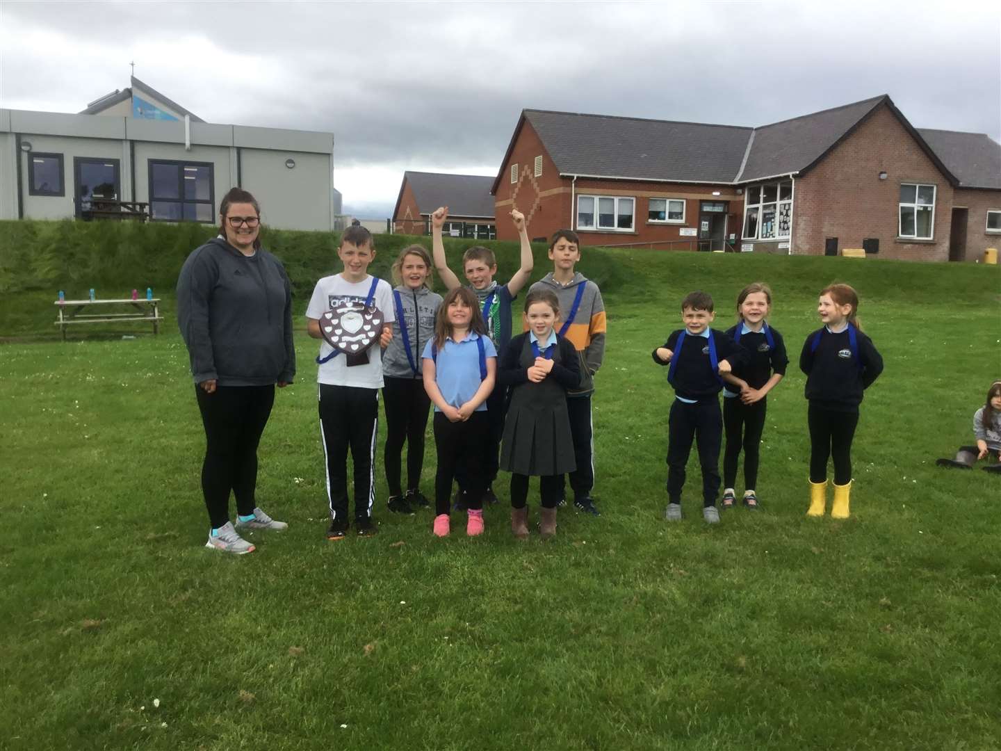 House captain Kieran Dooner was presented with the coveted shield by P4-7 teacher Eilidh Munro. Also pictured are team members: Isabella Mackenzie, Megan Maclean, Harry Maclean, Paige Mackay, Scott Drennan, Zach Matheson, Eliza Mackenzie and Lilly Mackay.