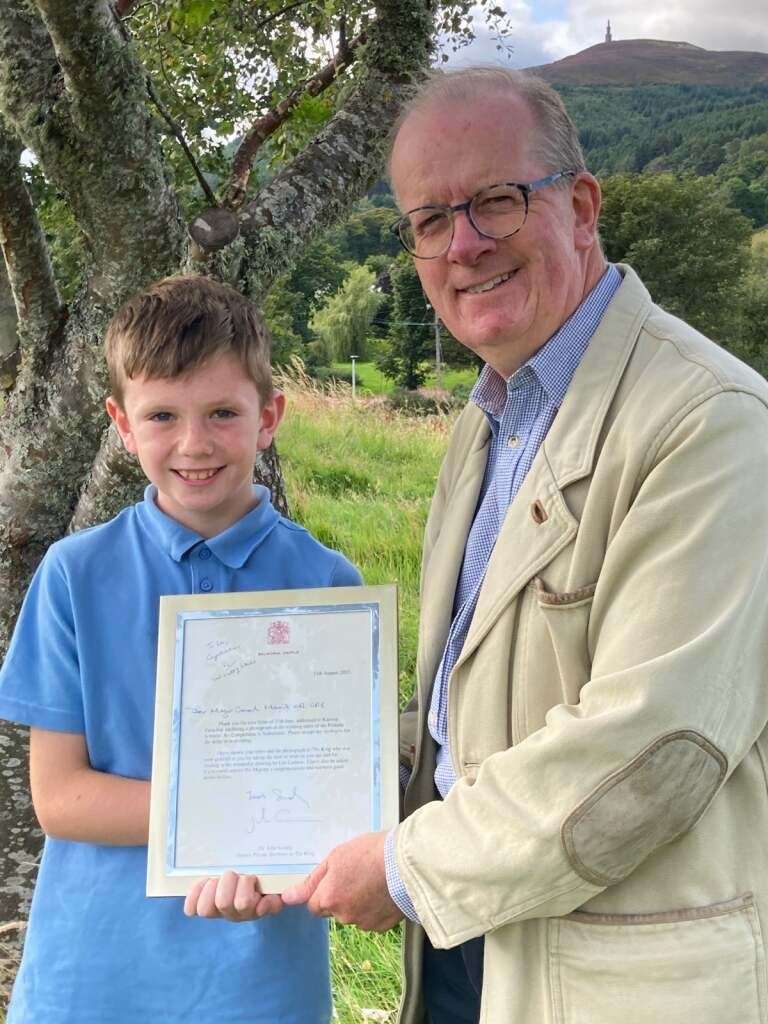 Art competition overall winner Leo Lannon was presented with a letter from King Charles III by Lord-Lieutenant Patrick Marriott.