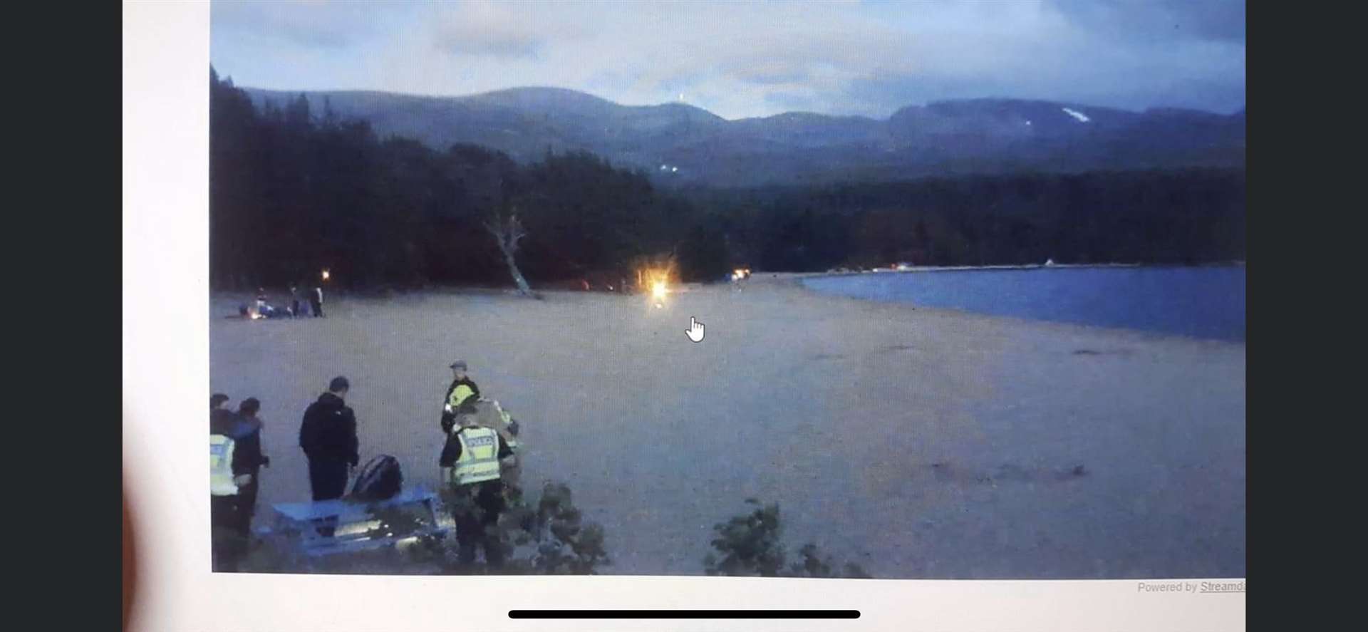 Police officers at Loch Morlich over the weekend shown via the webcam at the beauty spot.