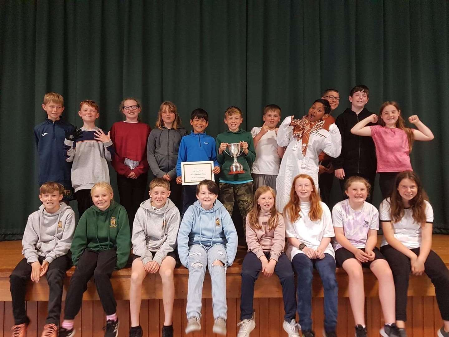 P6-7 pupils won the Nan Sutherland Trophy because of their caring attitude towards each other.