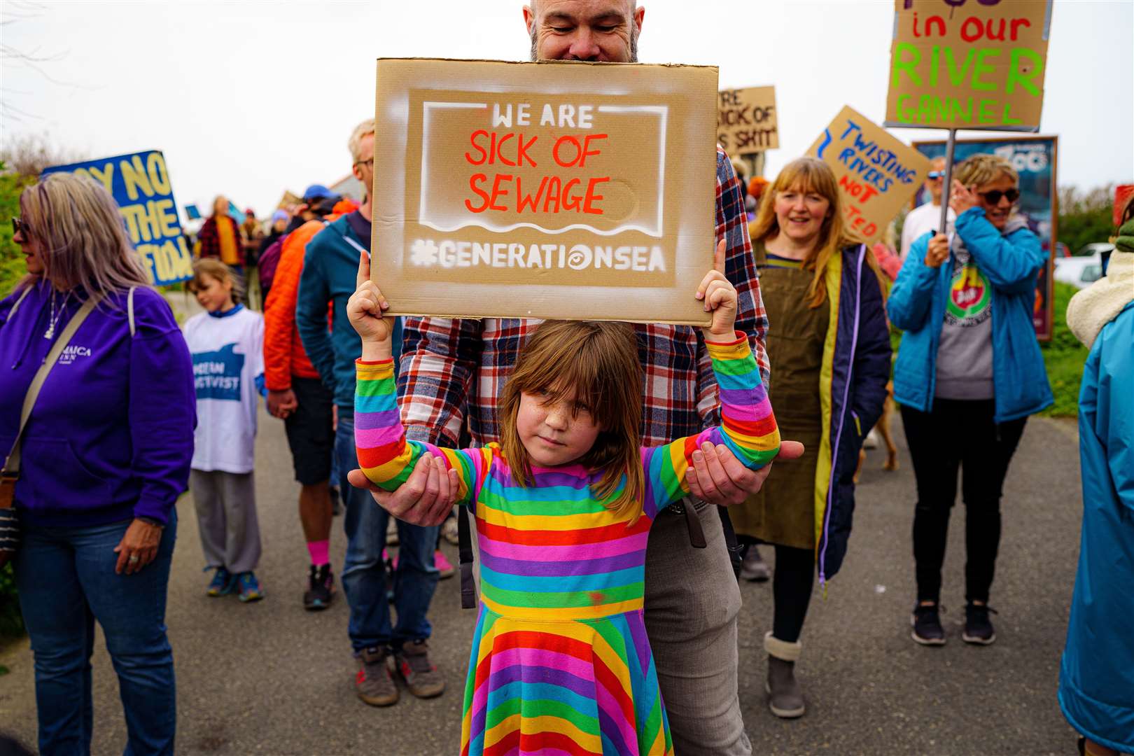 Campaigners march near Fistral Beach, Newquay, as they took part in a National Day of Action on Sewage Pollution in April 2022 (Ben Birchall/PA)