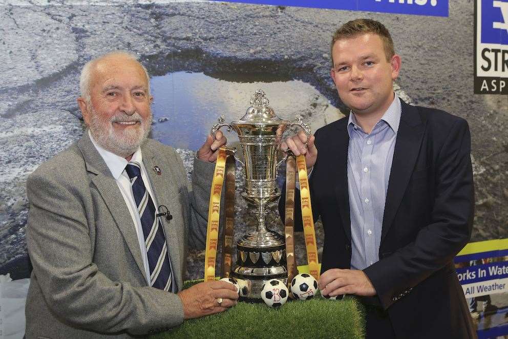 Highland League president George Manson and GPH Builders Merchants managing director Grant Shewan with the trophy.
