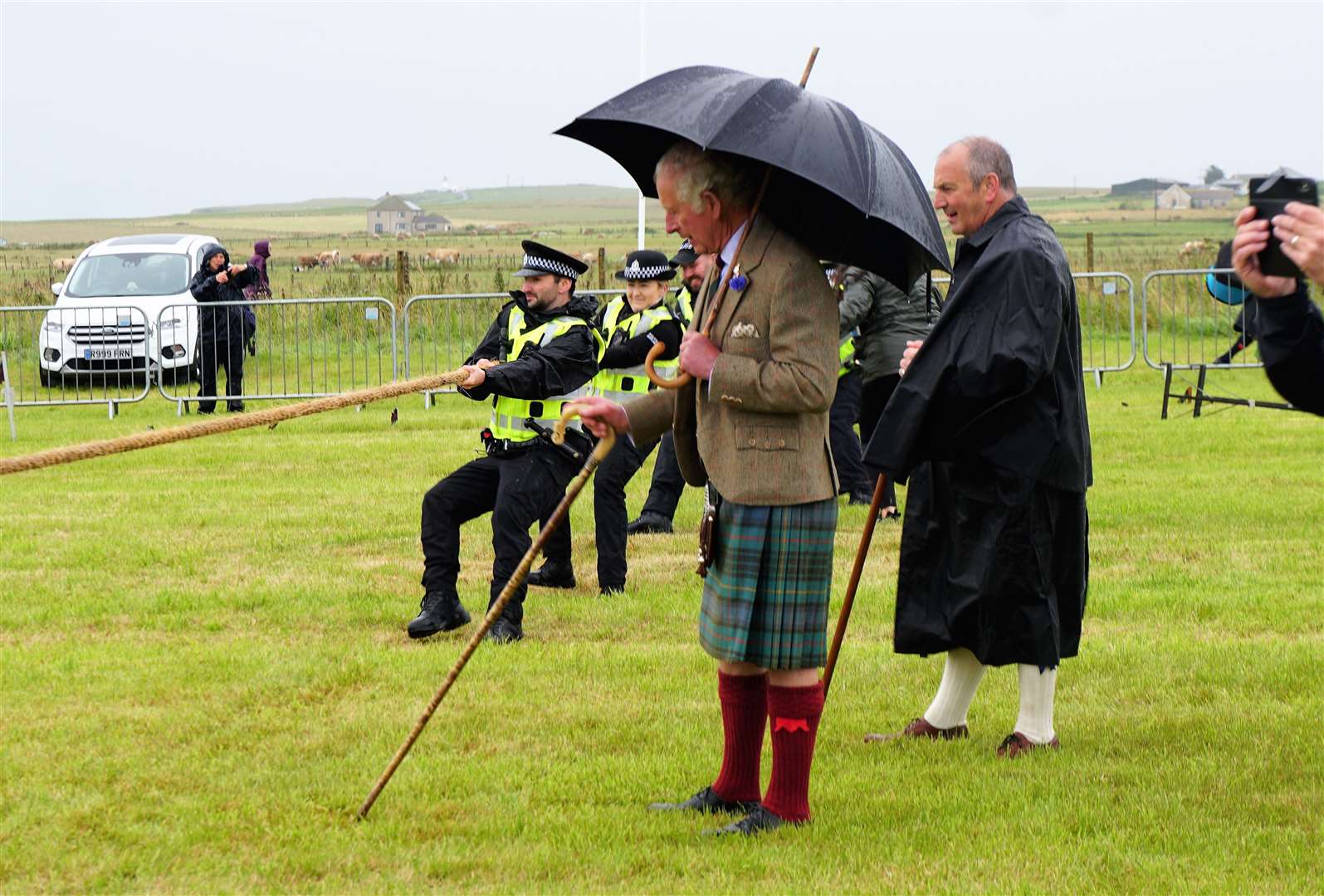 The prince adjudicated at the tug of war between Wounded Highlanders and the police team. Picture: DGS