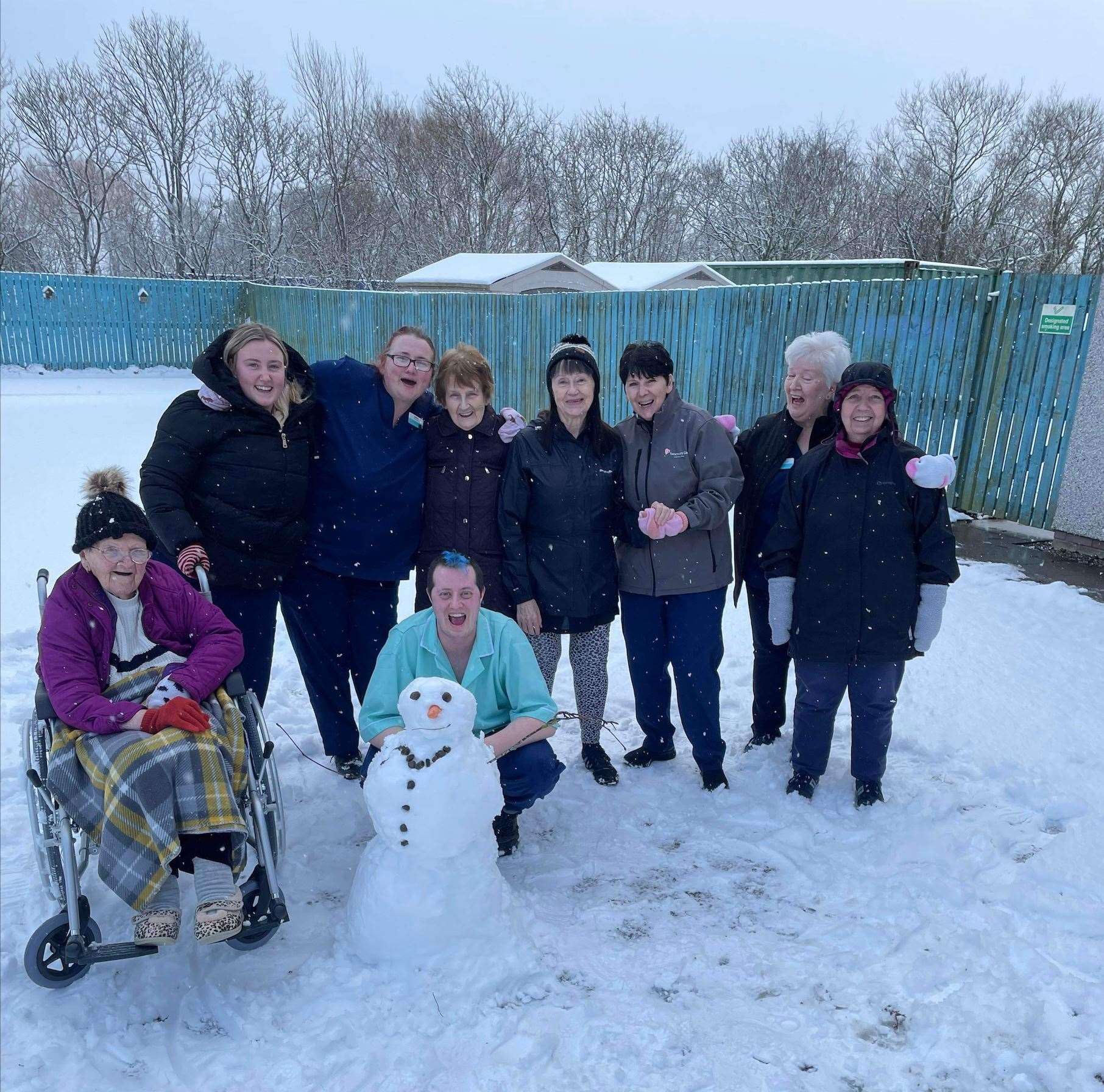Staff and residents make the most of the snowy weather at Meadows Care Home in Dornoch.