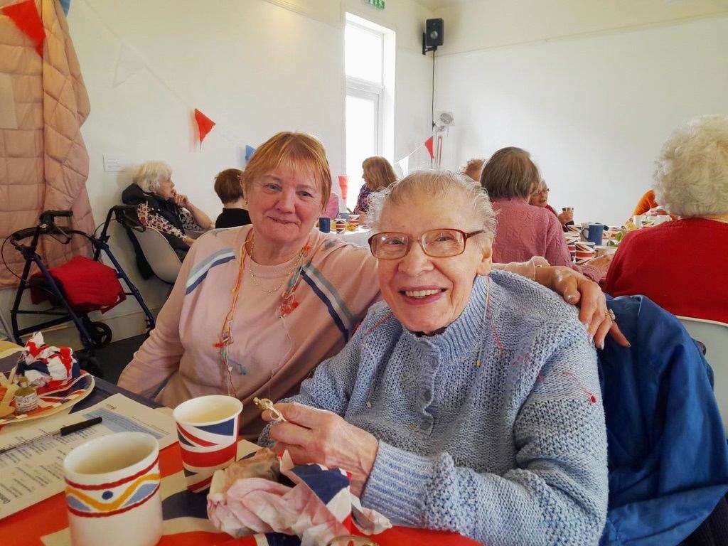 Christine, a befriender, and Ina, a befriendee, at a Befriending Caithness coronation celebration at Lyth Arts Centre in May.