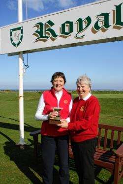 Alison Bartlett and North captain Liz Coghill with the Mary Benton Trophy.