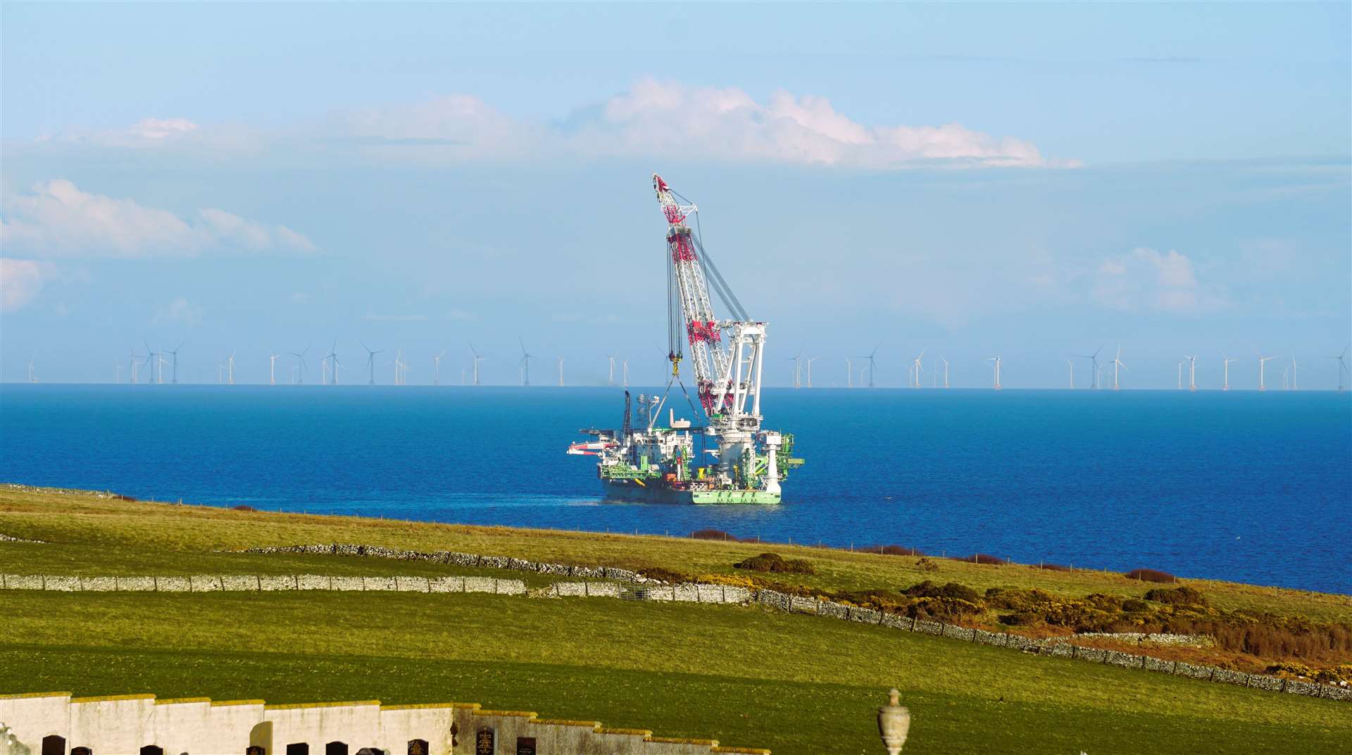The giant crane Orion was seen off the coast at Latheron on Friday afternoon. The ship is involved in work at the nearby Moray East Offshore Wind Farm. Picture: DGS