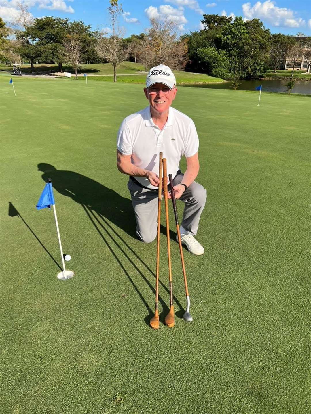 Bill MacDonald with his father's treasured hickory clubs which he is taking with him to the 100th anniversary Texas Open.