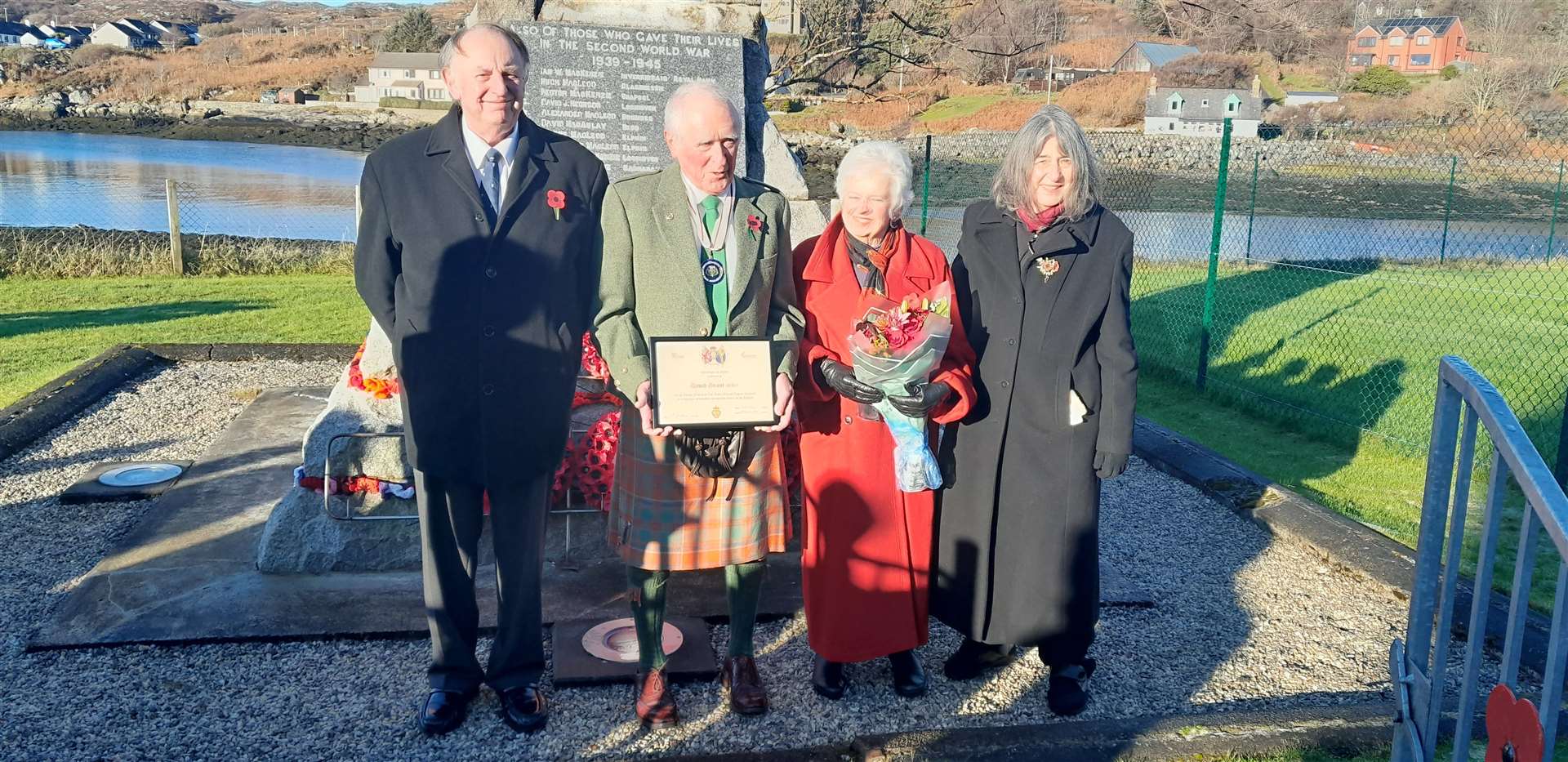 Retiring Deputy Lieutenant David Grant and his wife Norah were presented with a framed certificate and a bouquet of flowers by RBLS Assynt branch chairman Dr John Morgan and his wife Janet.