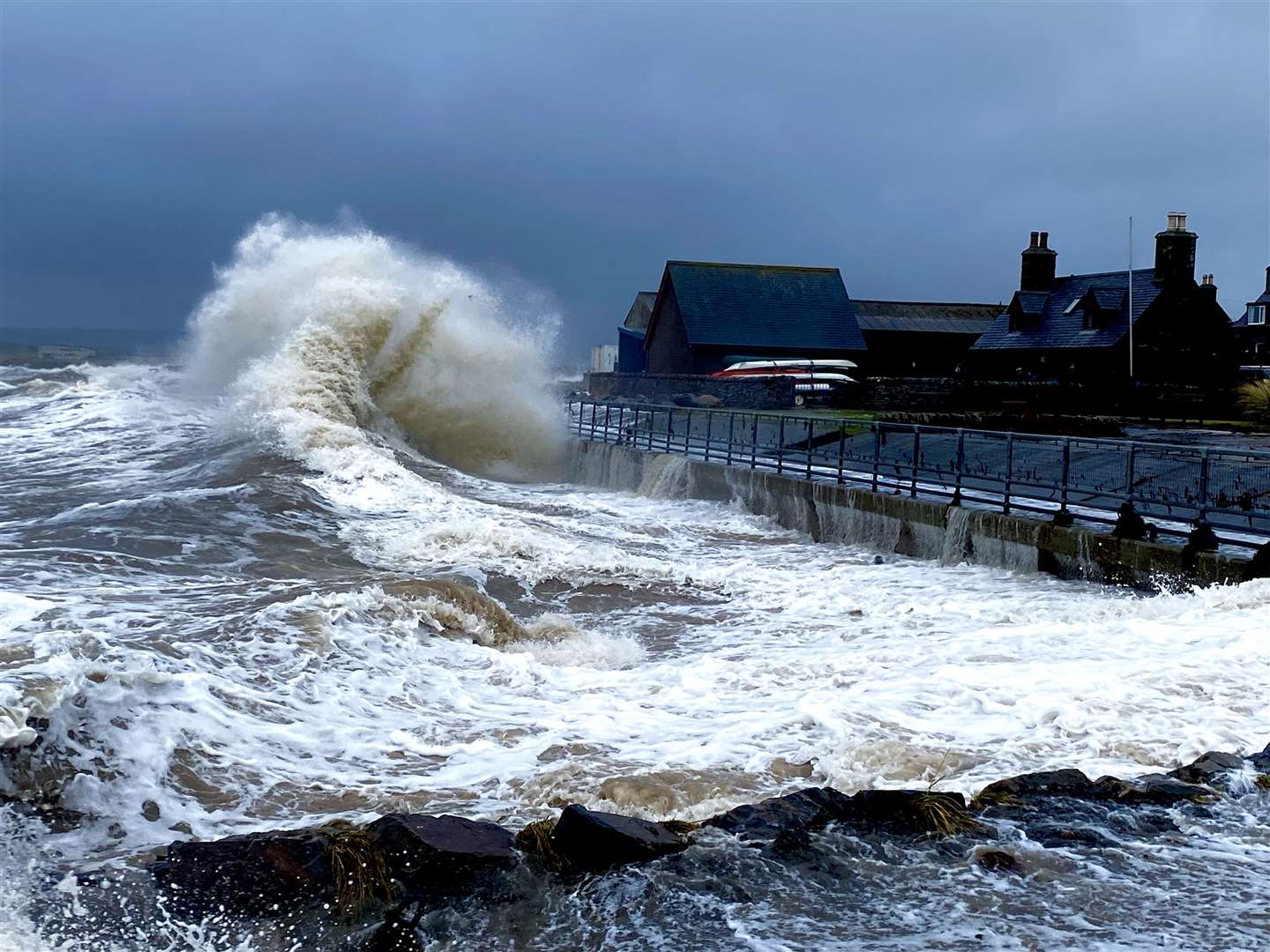 Barriers along the sea wall were completely flattened between the Seafront Centre and the Free Church of Scotland. Picture: David Richardson