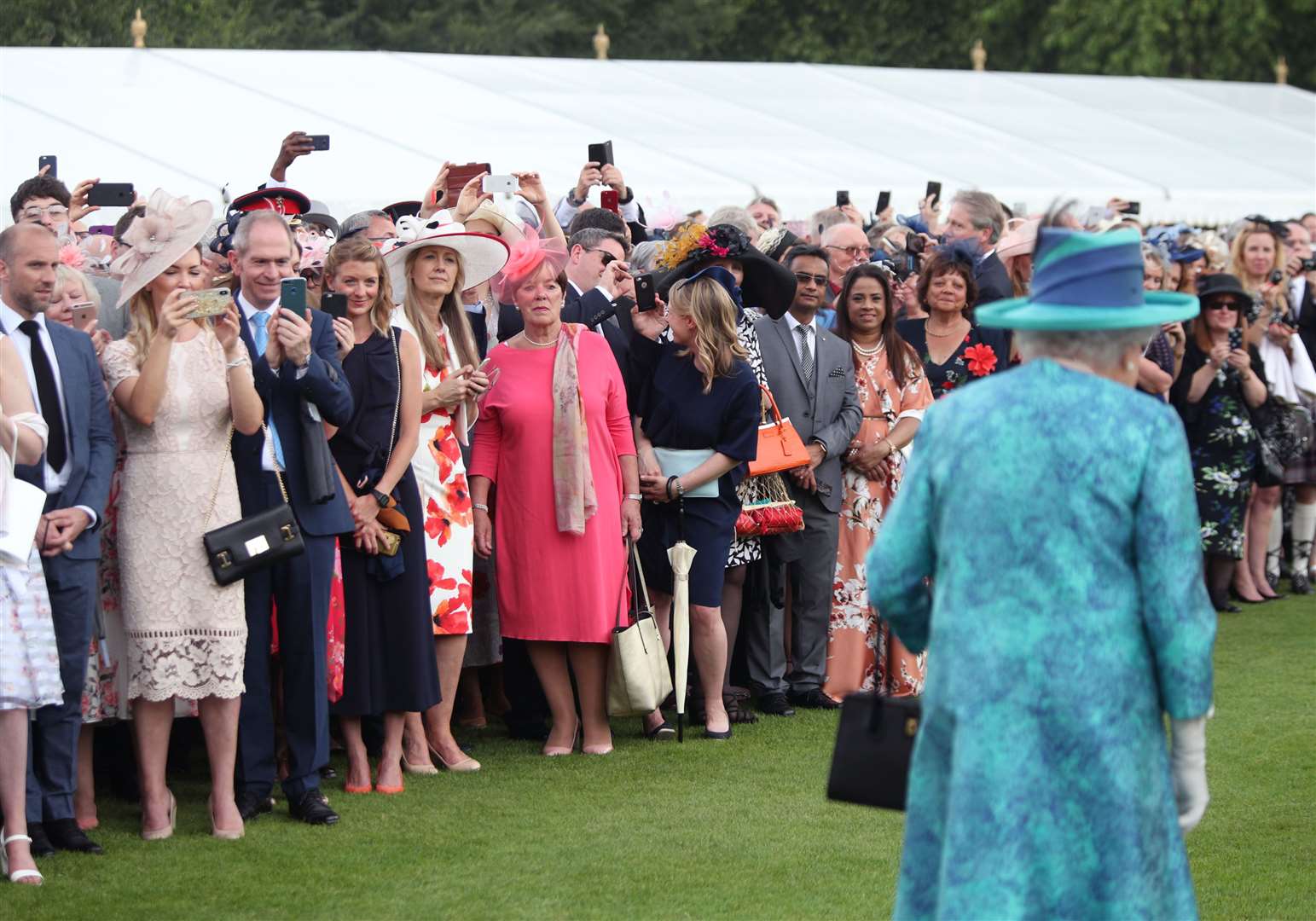 The Queen attending a Buckingham Palace garden party (Yui Mok/PA)
