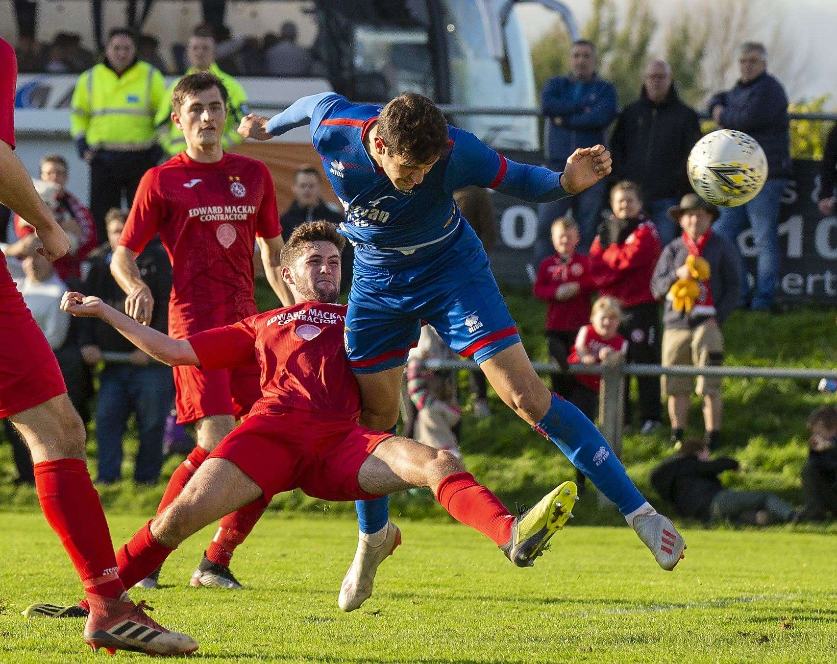 Tom Kelly challenge Caley Thistle's Nikolay Todorov for the ball in the North of Scotland Cup final in 2019.