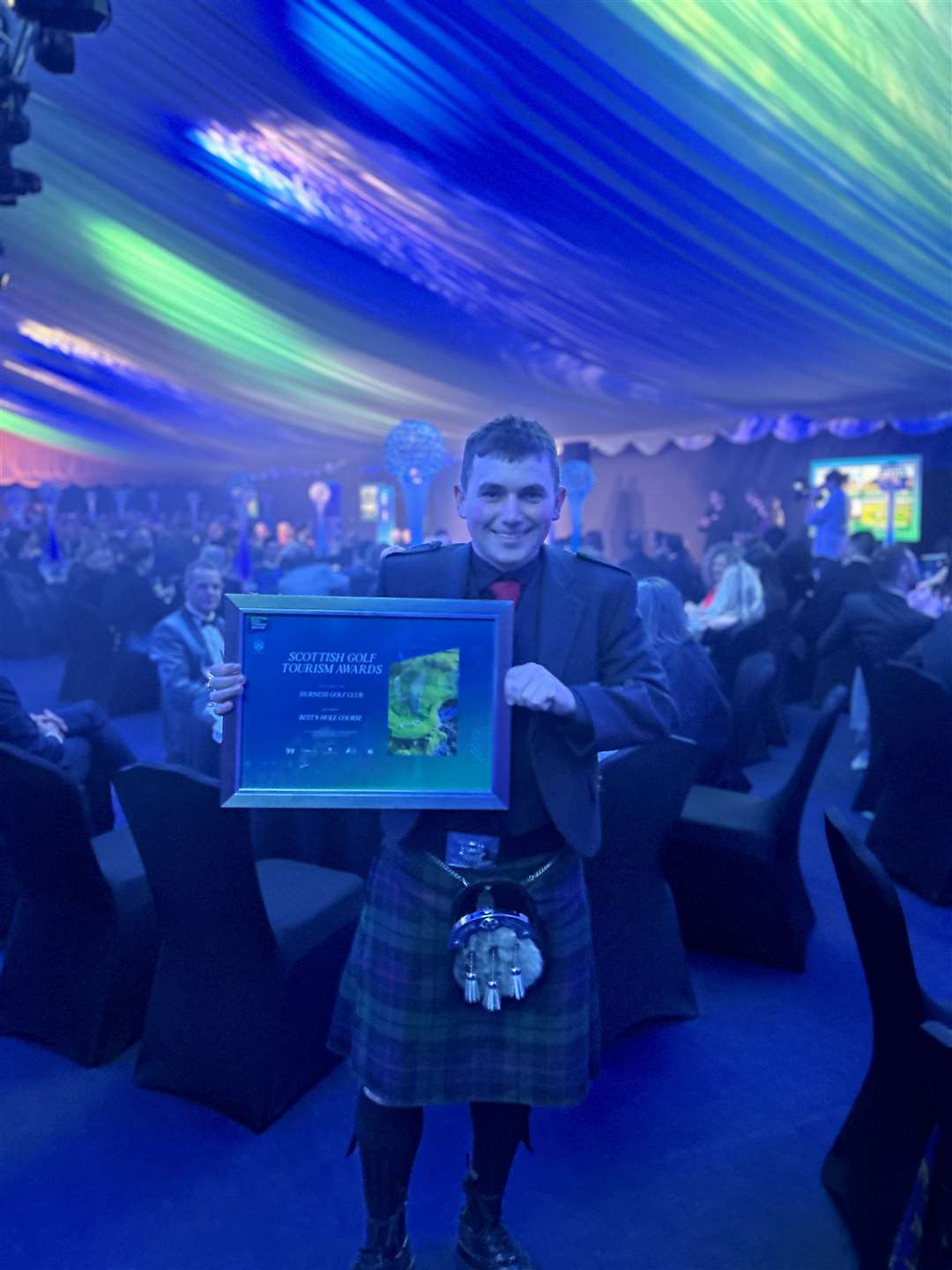 Head greenkeeper Alistair Morrison with the award.