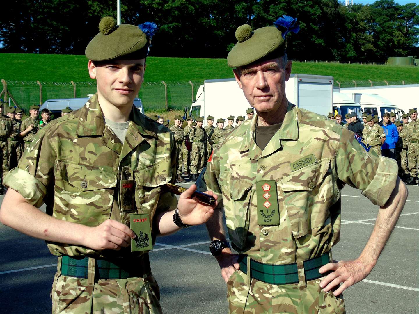 Tristan Jack being presented with his RSM rankslide by the battalion's Commandant Colonel Ian Cassidy.